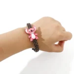 pulsera cuero stitch rosa